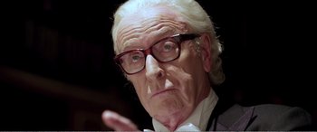 Movie still from “Youth” (2015), directed by Paolo Sorrentino – An old man with glasses and a white beard; Close Up shot, Low angle