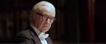 Movie still from “Youth” (2015), directed by Paolo Sorrentino – An old man wearing glasses and a bow tie; Close Up shot, Low angle