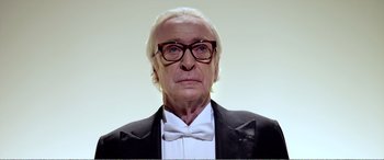 Movie still from “Youth” (2015), directed by Paolo Sorrentino – An older man wearing a tuxedo and bow tie; Close Up shot, Low angle