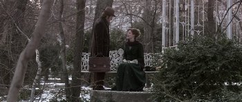 Movie still from “Youth Without Youth” (2007), directed by Francis Ford Coppola – A man and a woman sitting on a park bench; Wide shot, Over the shoulder angle