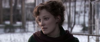 Movie still from “Youth Without Youth” (2007), directed by Francis Ford Coppola – A person wearing a scarf; Close Up shot, Over the shoulder angle