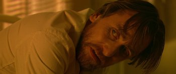 Movie still from “Youth Without Youth” (2007), directed by Francis Ford Coppola – A person with a beard; Close Up shot, Low angle