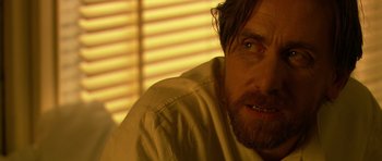 Movie still from “Youth Without Youth” (2007), directed by Francis Ford Coppola – A person with a beard; Close Up shot, Over the shoulder angle
