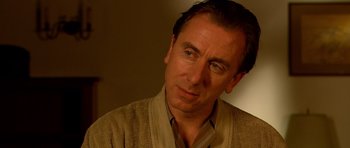 Movie still from “Youth Without Youth” (2007), directed by Francis Ford Coppola – A person wearing a jacket; Close Up shot, Over the shoulder angle