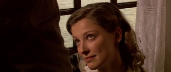 Movie still from “Youth Without Youth” (2007), directed by Francis Ford Coppola – A woman's face in front of the water; Close Up shot, Over the shoulder angle