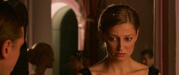 Movie still from “Youth Without Youth” (2007), directed by Francis Ford Coppola – A woman looking at her reflection in a mirror; Close Up shot, Over the shoulder angle