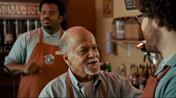 Movie still from “Zack and Miri Make a Porno” (2008), directed by Kevin Smith – An older man wearing a kippah is looking at the camera; Medium shot, Over the shoulder angle