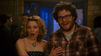 Movie still from “Zack and Miri Make a Porno” (2008), directed by Kevin Smith – A man and a woman standing next to each other; Close Up shot, Over the shoulder angle
