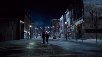 Movie still from “Zack and Miri Make a Porno” (2008), directed by Kevin Smith – Two people walking down a street at night; Extreme Wide shot, High angle