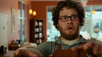 Movie still from “Zack and Miri Make a Porno” (2008), directed by Kevin Smith – A person wearing glasses; Close Up shot, Low angle