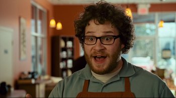 Movie still from “Zack and Miri Make a Porno” (2008), directed by Kevin Smith – A man with a surprised look on his face; Close Up shot, Over the shoulder angle