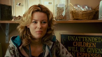 Movie still from “Zack and Miri Make a Porno” (2008), directed by Kevin Smith – A person in a kitchen; Medium shot, Over the shoulder angle