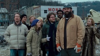 Movie still from “Zack and Miri Make a Porno” (2008), directed by Kevin Smith – A group of people standing in front of a building; Medium shot, Over the shoulder angle