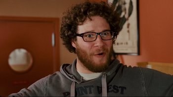 Movie still from “Zack and Miri Make a Porno” (2008), directed by Kevin Smith – A person wearing glasses and a hoodie; Close Up shot, Overhead angle