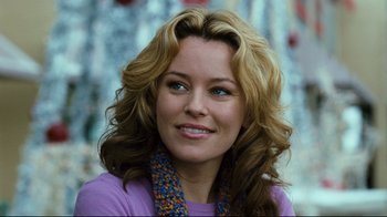 Movie still from “Zack and Miri Make a Porno” (2008), directed by Kevin Smith – A person wearing a purple shirt; Close Up shot, Over the shoulder angle