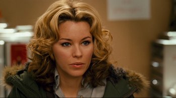 Movie still from “Zack and Miri Make a Porno” (2008), directed by Kevin Smith – A person with long hair; Close Up shot, Over the shoulder angle