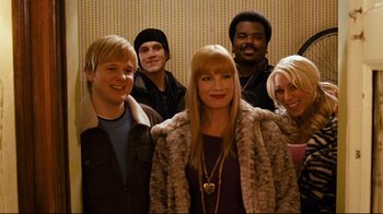 Movie still from “Zack and Miri Make a Porno” (2008), directed by Kevin Smith – A group of people standing next to each other in a room; Medium shot, High angle