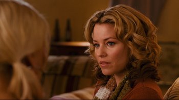 Movie still from “Zack and Miri Make a Porno” (2008), directed by Kevin Smith – A person sitting in a room; Close Up shot, Over the shoulder angle