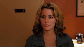 Movie still from “Zack and Miri Make a Porno” (2008), directed by Kevin Smith – A person with long hair; Close Up shot, Over the shoulder angle