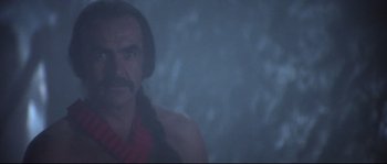 Movie still from “Zardoz” (1974), directed by John Boorman – A person with a beard and mustache; Close Up shot, Low angle