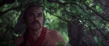 Movie still from “Zardoz” (1974), directed by John Boorman – A person with a beard and mustache; Close Up shot, Low angle