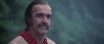 Movie still from “Zardoz” (1974), directed by John Boorman – An older man with a beard and a mustache; Close Up shot, Low angle