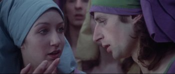 Movie still from “Zardoz” (1974), directed by John Boorman – A group of young people standing next to each other; Close Up shot, Over the shoulder angle