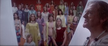 Movie still from “Zardoz” (1974), directed by John Boorman – A group of young girls standing next to each other; Medium shot, High angle