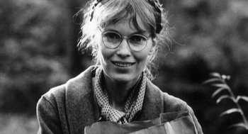 Movie still from “Zelig” (1983), directed by Woody Allen – A black and white photo of a woman wearing glasses; Close Up shot, High angle
