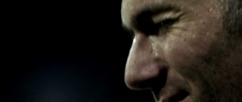 Movie still from “Zidane: A 21st Century Portrait” (2006), directed by Philippe Parreno – A man's face with tears coming out of his eyes; Extreme Close Up shot, Low angle