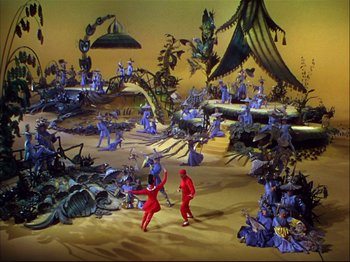 Movie still from “Ziegfeld Follies” (1945), directed by Roy Del Ruth – A group of people standing in a field with a lot of people; Extreme Wide shot, High angle