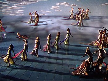 Movie still from “Ziegfeld Follies” (1945), directed by Roy Del Ruth – A group of women are dancing on a stage; Extreme Wide shot, High angle