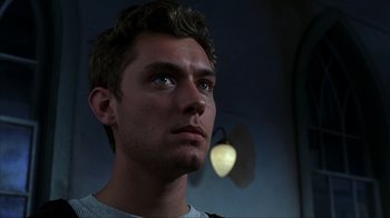 Movie still from “eXistenZ” (1999), directed by David Cronenberg – A person looking up at the ceiling; Close Up shot, Low angle