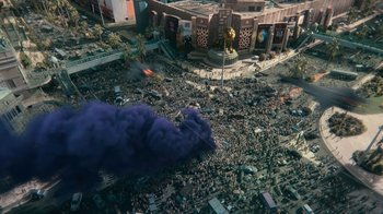 Movie still from “Army of the Dead” (2021), directed by Zack Snyder – An aerial view of a city with smoke coming out of it; Extreme Wide shot, High angle