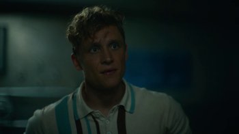 Movie still from “Army of the Dead” (2021), directed by Zack Snyder – A young man is looking into the distance; Close Up shot, Low angle