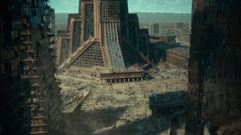 Movie still from “Army of the Dead” (2021), directed by Zack Snyder – An aerial view of an abandoned city with a lot of rubble; Extreme Wide shot, High angle