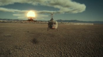Movie still from “Army of the Dead” (2021), directed by Zack Snyder – A helicopter sitting on top of a dry grass field; Extreme Wide shot, High angle