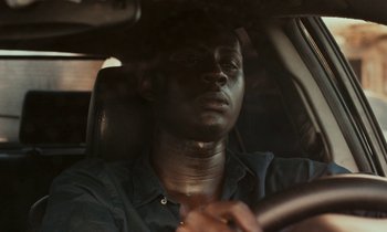 Movie still from “Atlantics” (2019), directed by Mati Diop – Close Up shot, High angle