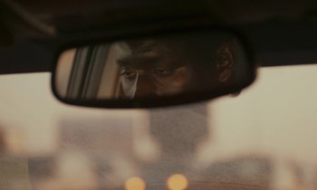 Movie still from “Atlantics” (2019), directed by Mati Diop – Extreme Close Up shot, Over the shoulder angle