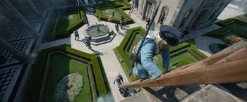 Movie still from “Bardo: False Chronicle of a Handful of Truths” (2022), directed by Alejandro G. Iñárritu – An aerial view of a man on a high platform; Extreme Wide shot, Overhead angle