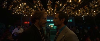 Movie still from “Bardo: False Chronicle of a Handful of Truths” (2022), directed by Alejandro G. Iñárritu – A couple of men standing next to each other; Close Up shot, Low angle