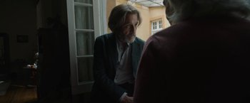 Movie still from “Bardo: False Chronicle of a Handful of Truths” (2022), directed by Alejandro G. Iñárritu – An older man sitting in front of a woman; Close Up shot, Over the shoulder angle