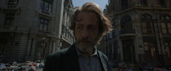 Movie still from “Bardo: False Chronicle of a Handful of Truths” (2022), directed by Alejandro G. Iñárritu – A person wearing a jacket; Close Up shot, Low angle