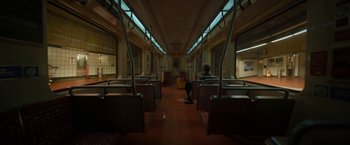 Movie still from “Bardo: False Chronicle of a Handful of Truths” (2022), directed by Alejandro G. Iñárritu – A person sitting on a train looking out the window; Extreme Wide shot, High angle