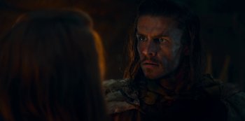 Movie still from “Barbarians” (2020), created by Arne Nolting – A person looking at the camera; Close Up shot, Over the shoulder angle