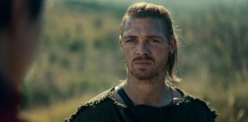 Movie still from “Barbarians” (2020), created by Arne Nolting – A person with long hair; Close Up shot, Over the shoulder angle