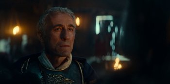 Movie still from “Barbarians” (2020), created by Arne Nolting – An older man is looking into the distance; Close Up shot, Over the shoulder angle