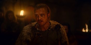 Movie still from “Barbarians” (2020), created by Arne Nolting – A person wearing a costume; Close Up shot, Low angle