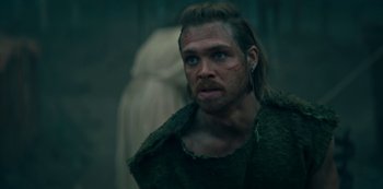 Movie still from “Barbarians” (2020), created by Arne Nolting – A person with long hair; Close Up shot, Over the shoulder angle