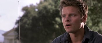 Movie still from “Joy Ride” (2001), directed by John Dahl – A person looking at the camera; Close Up shot, Over the shoulder angle